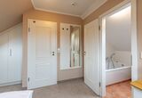 Schlafzimmer oben mit Bad en Suite